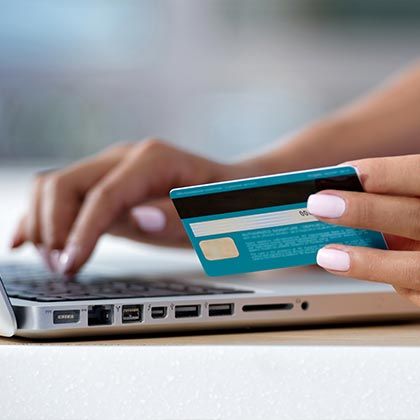 Credit Card and Lady Typing